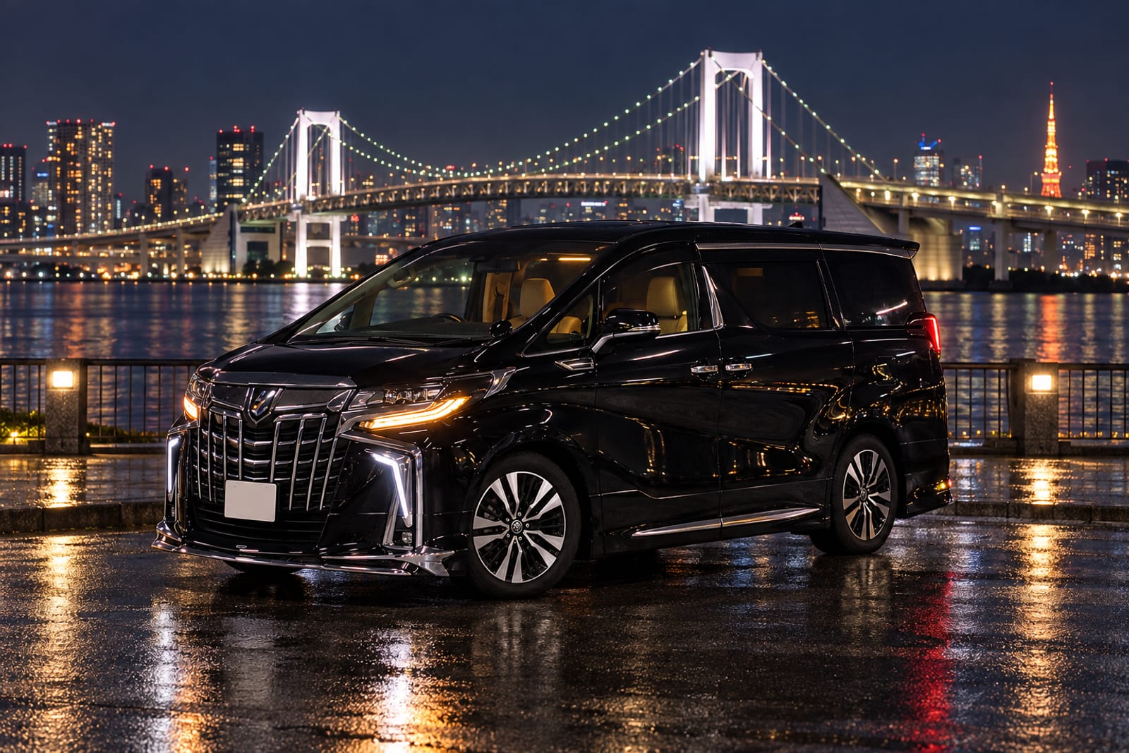 夜の海辺に停めた送迎車